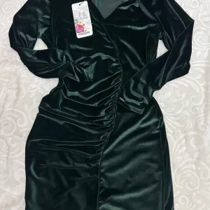 Plisana P…S…haljina