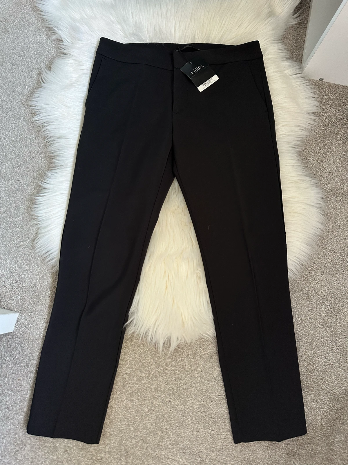 Elegantne pantalone sa etiketom