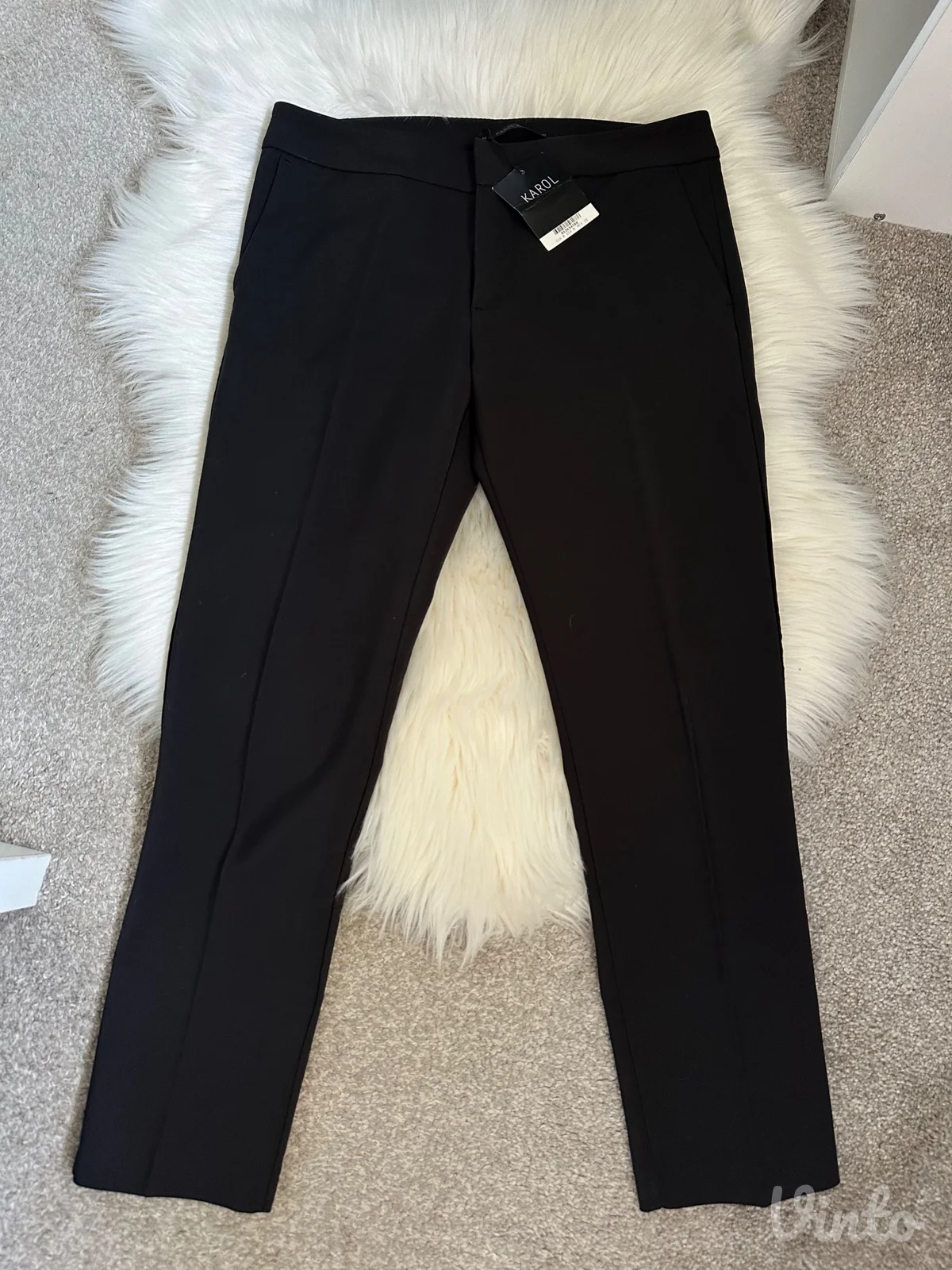 Elegantne pantalone sa etiketom