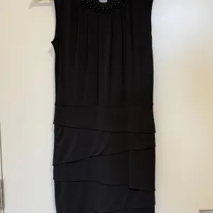 Orsay - Elegantna crna haljina