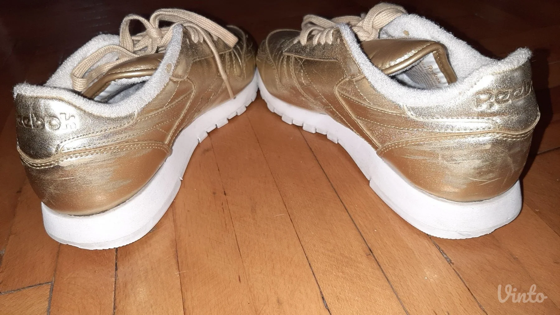 Zlatne Reebok patike