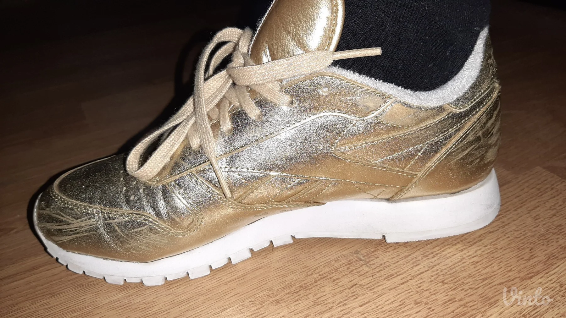 Zlatne Reebok patike