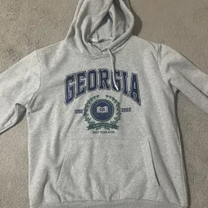 Koton,siva dukserica