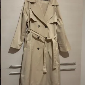 Sinsay dugi trench kaput krem