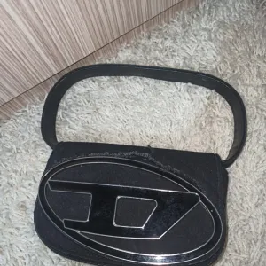 ženska diesel torbica