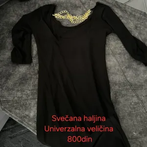 Crna haljina s lancima
