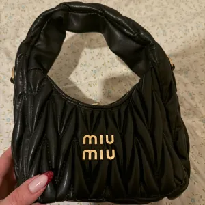 Miu Miu torbica