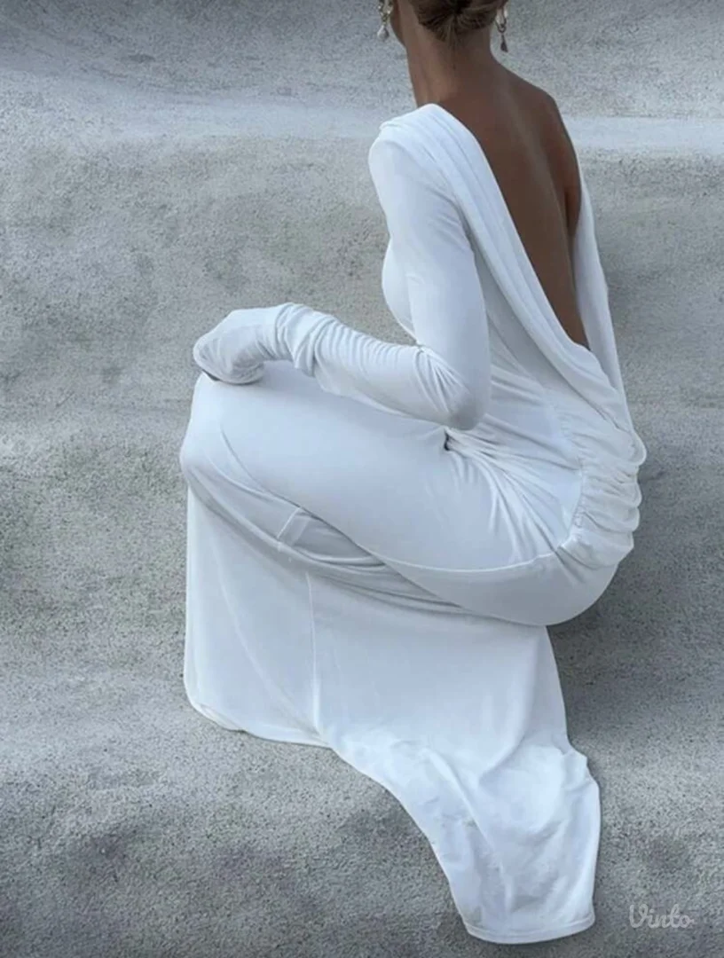 Ženstvena bela haljina