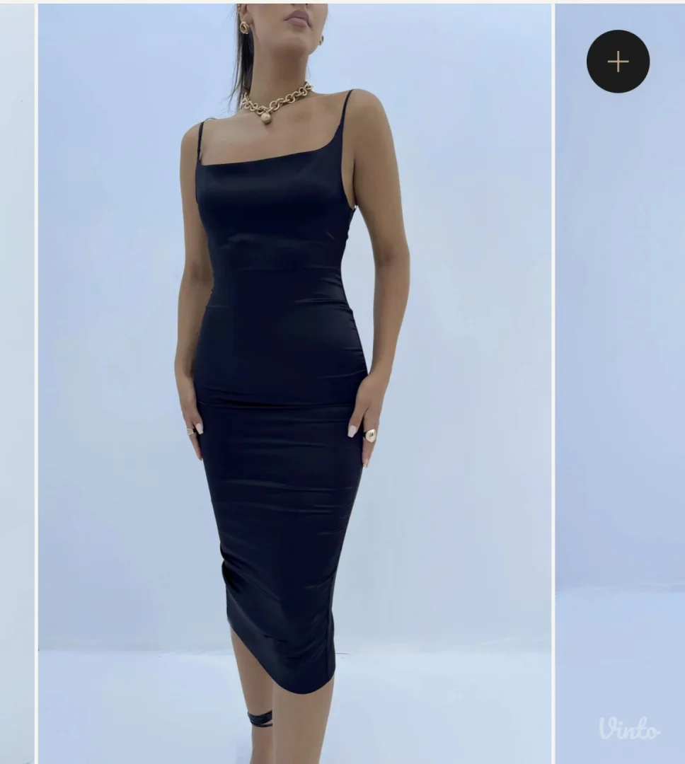 Crna satenska haljina, sa etiketom