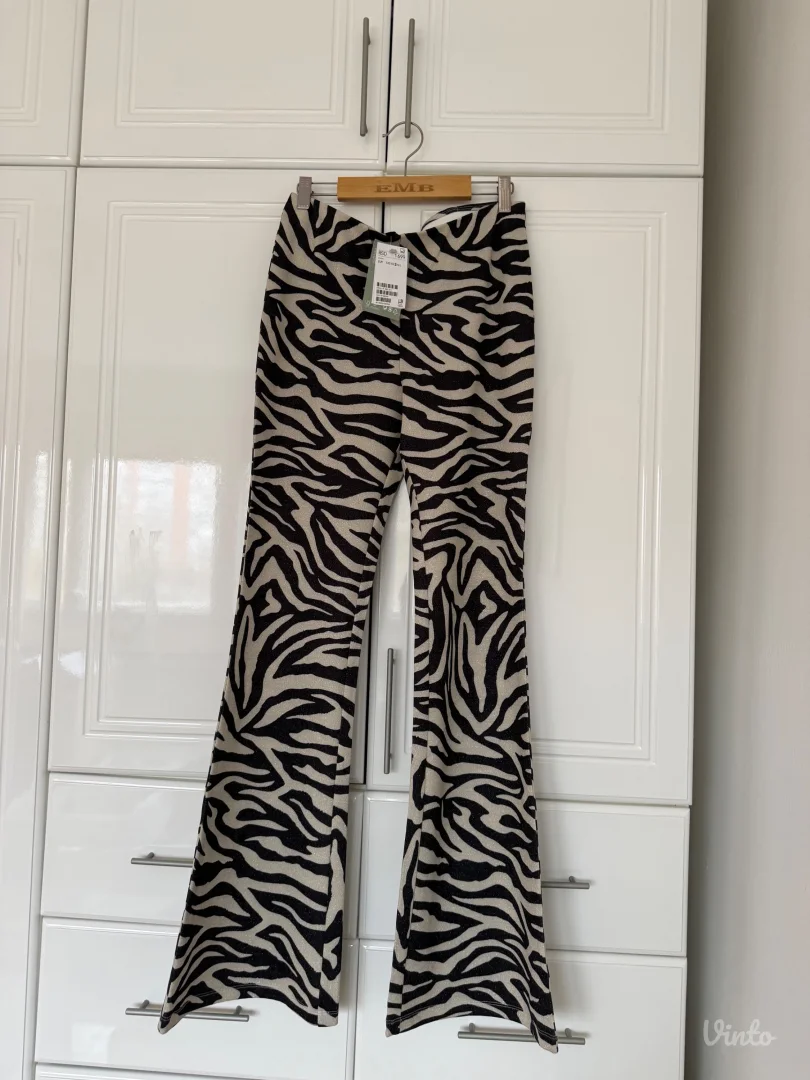 H&M helanke nove sa etiketom S