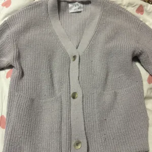 Ljubičasti džemper