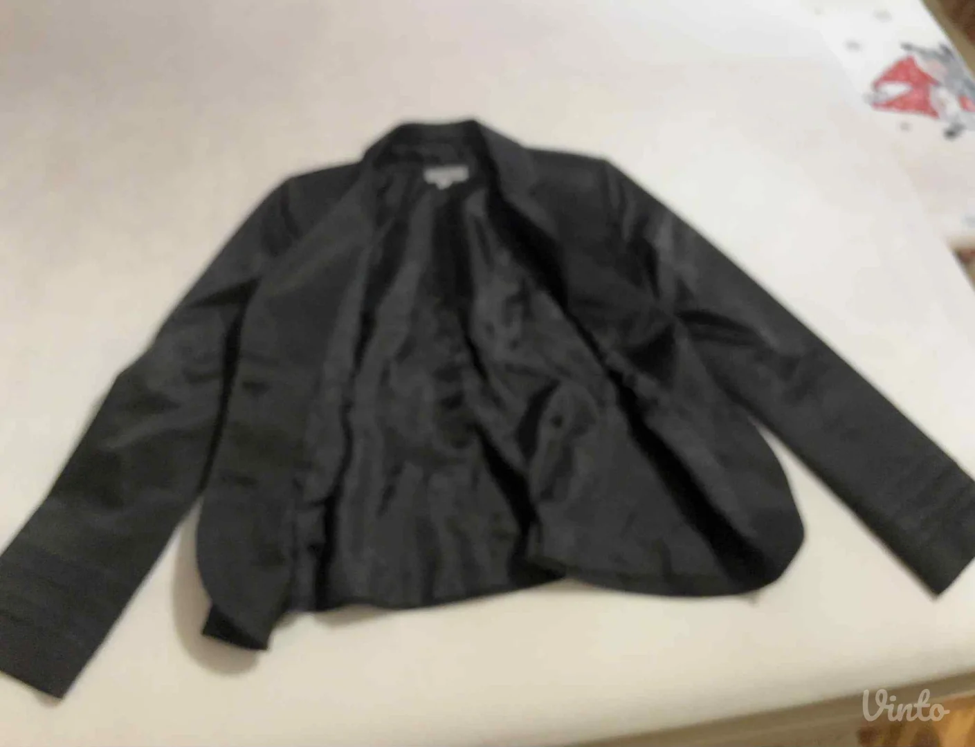 Potpuno ocuvan Happening sako