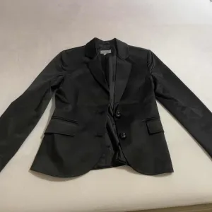 Potpuno ocuvan Happening sako