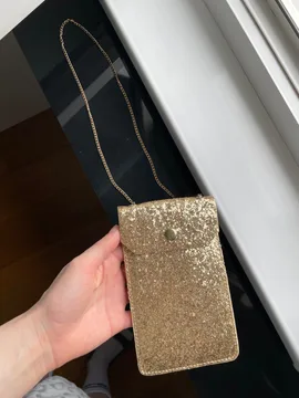 Mini zlatna torbica za telefon