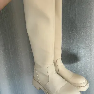 Krem čizme do kolena