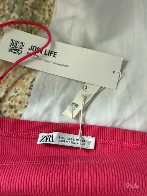 Zarin top sa etiketom